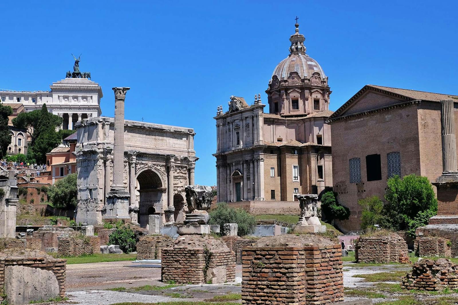 View of the Roman Forum with the Colosseum in the background